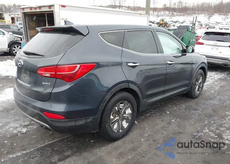 2014 Hyundai Santa Fe Sport 2.4L z USA, uszkodzony, nr VIN 5XYZT3LBXEG203783
